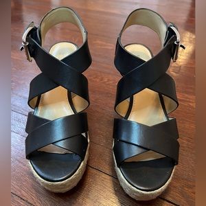 Michael Kors Celia Mid Wedge. Size 6.5. Only worn a couple times. EUC